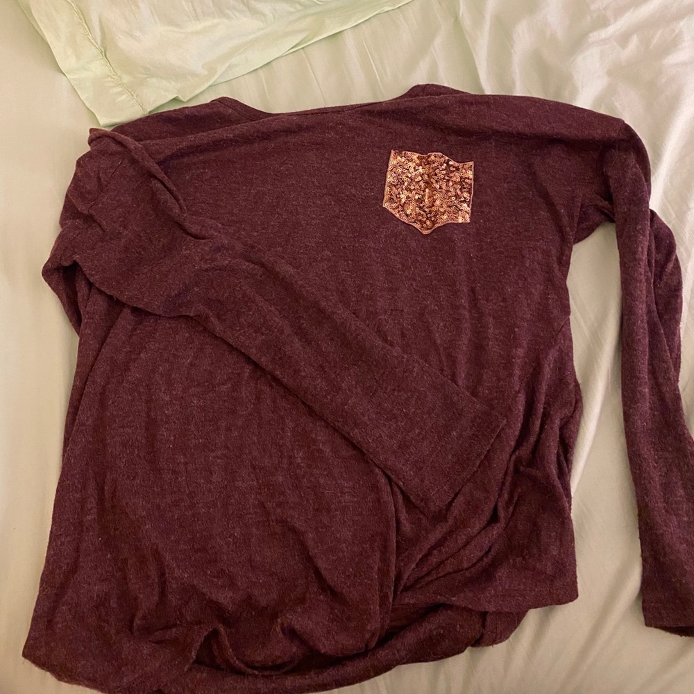 Trend:notes knot front, sequin pocket top